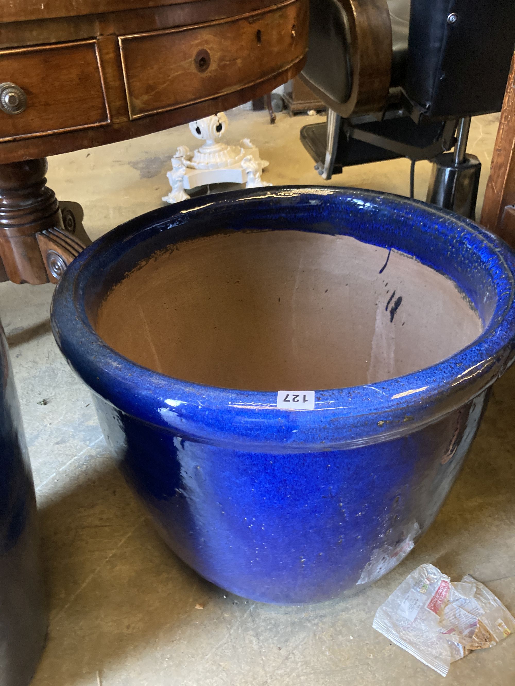 Two blue glazed circular garden planters, larger 54cm diameter, height 46cm